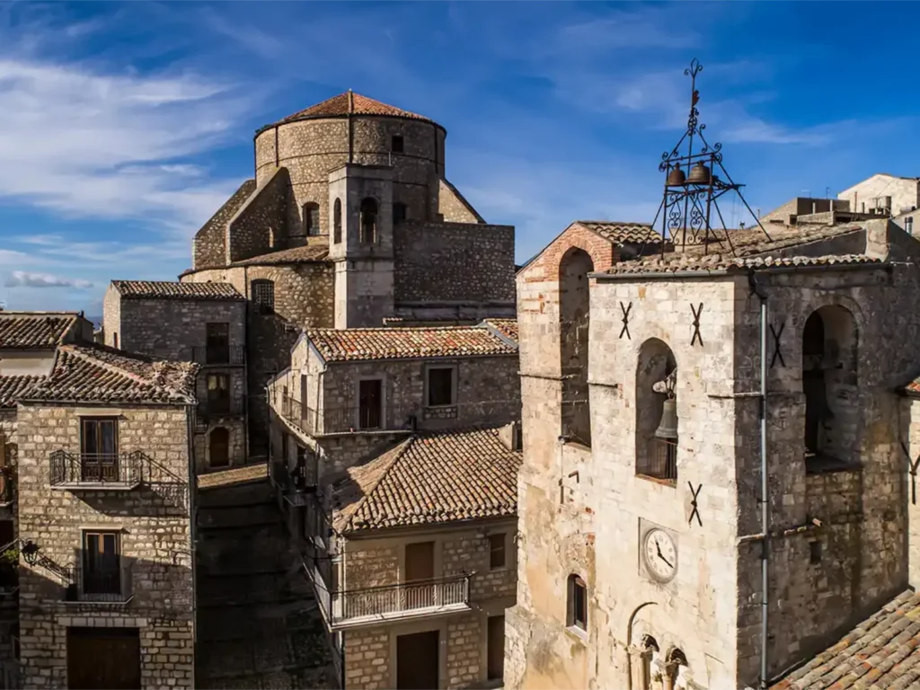 Visit Petralia Soprana: il campanile della Chiesa Madre dei SS. Pietro e Paolo e, sullo sfondo, la Chiesa del SS. Salvatore tra i tetti del borgo